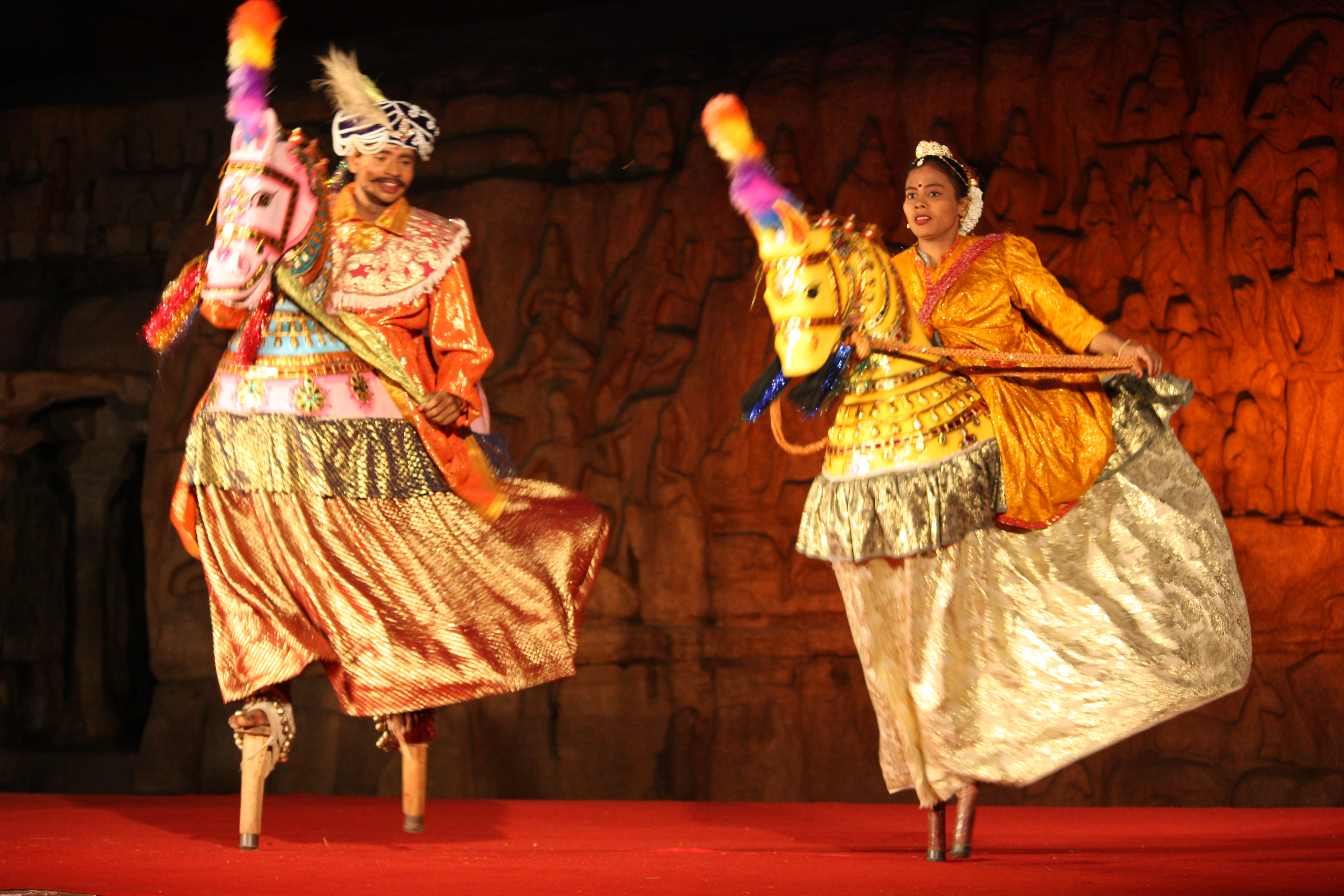 Classical Bharatanatyam dancer performing in a traditional Tamil temple