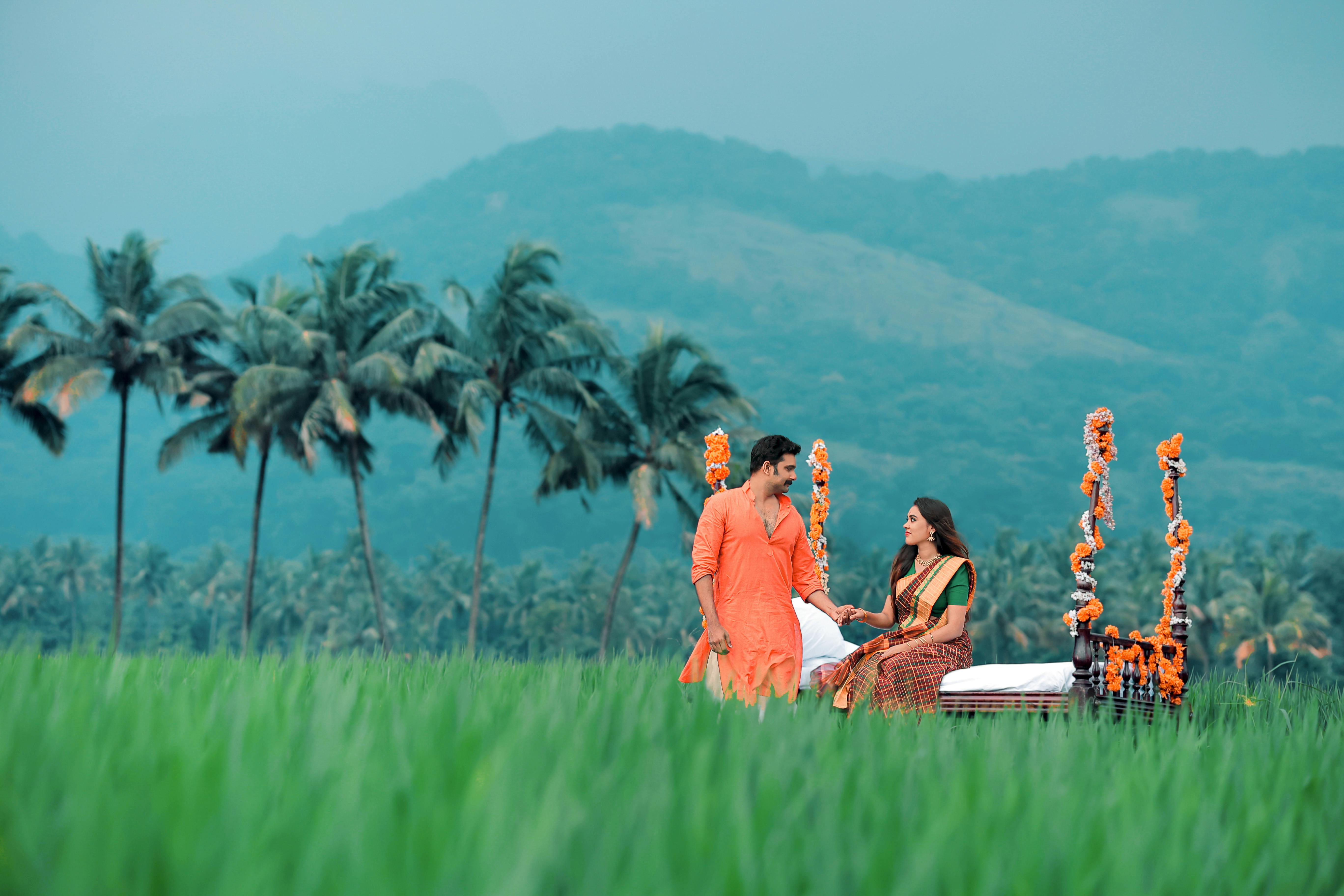 Romantic couple enjoying a sunset at the beach in Tamil Nadu