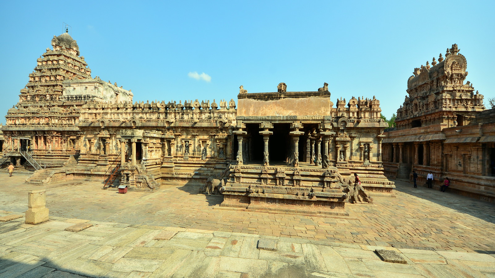 Pilgrims gathering at Navagraha temple during sunrise in Tamil Nadu